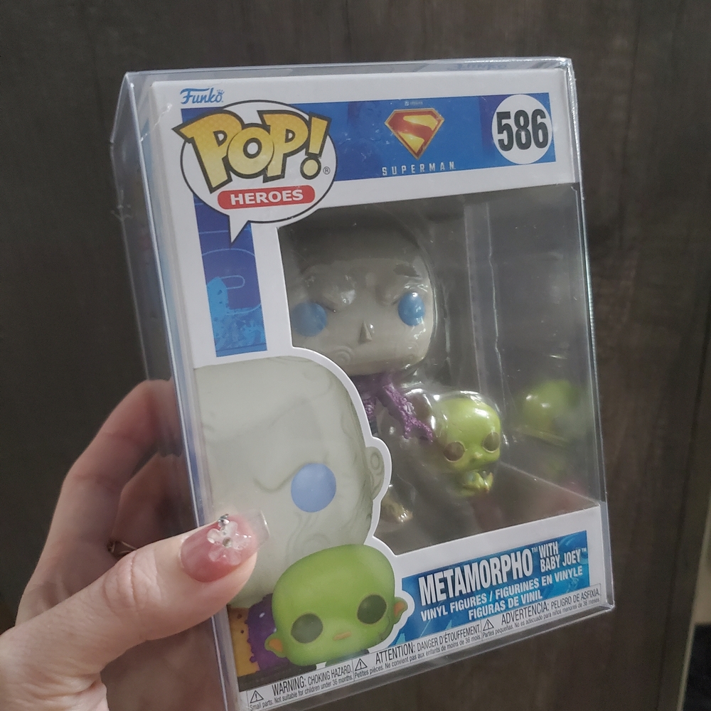 Funko Pop! Heroes: Metamorpho with Baby Joey #586 vinyl figure set.